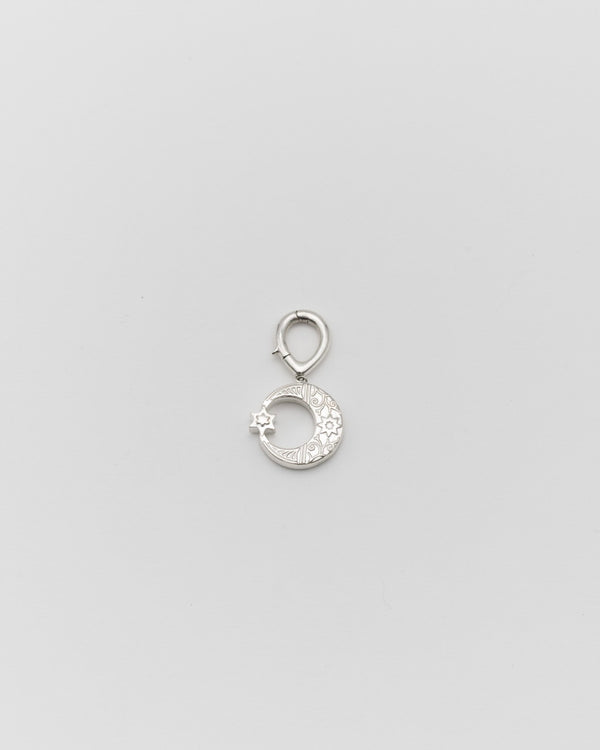 Moon star charm